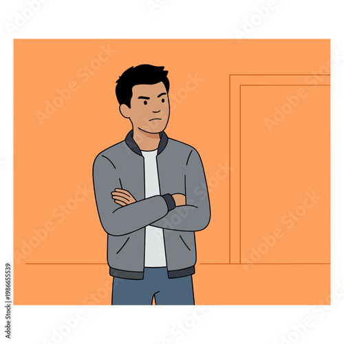 A man stands with his arms crossed in an interior room.