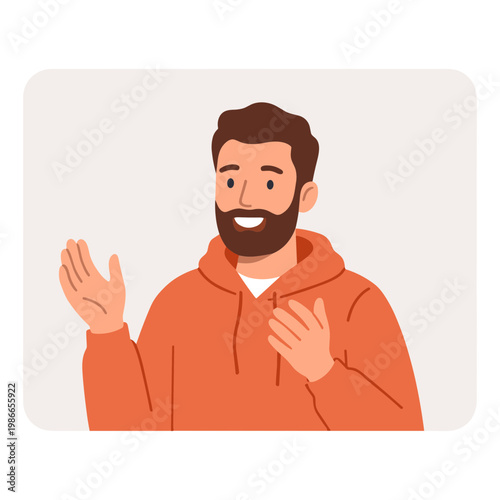 Smiling man with beard gesturing in friendly manner indoors