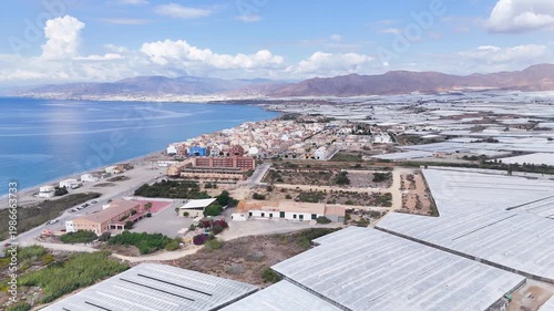 city coast industry town border greenhouse industrial plastic sea farming production drone texture roof vacation housing summer travel business success - Andalusia, Spain - 2025