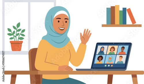 A woman in a hijab waving at a laptop screen with people in a home office