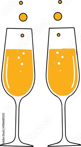 Two champagne glasses filled with bubbly drink on table