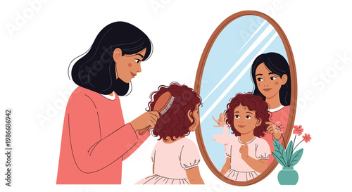 Caring mother using a wooden brush to style her young daughters curly hair while looking together into a large oval mirror in a room.