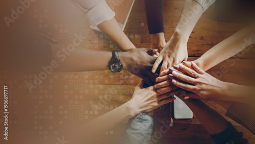 Tableau sur toile Hands joined over wooden table