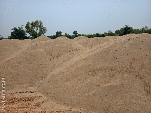Sandy soil background where the water flows.