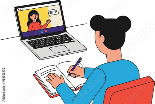 Student learning online via laptop, taking notes in notebook, distance education