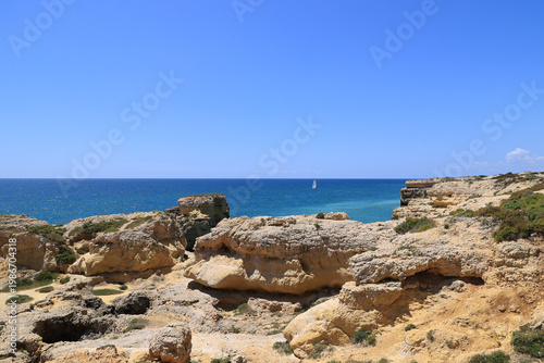 View of the horizon over water at the coast of Algarve, Albufeira, Portugal