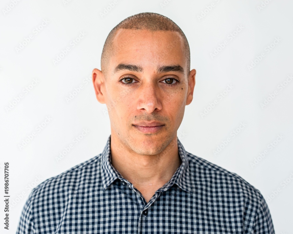 Obraz premium Confident man in checkered shirt.