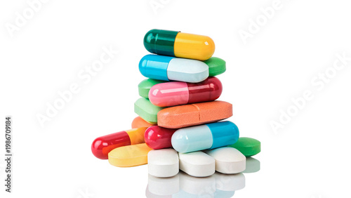 Colorful piles of various capsules and tablets stacked isolated on transparent background cut out