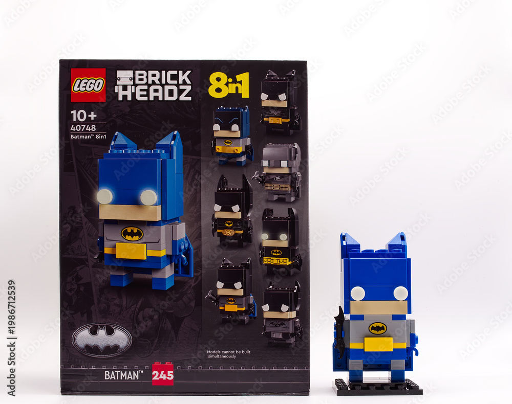 Naklejka premium Bologna - Italy - April 14, 2026: Lego brickheadz Batman eight in one buildable figure and original box against a white background.