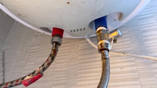 Water Leak from Pipe Showing Household Plumbing Problem, closeup