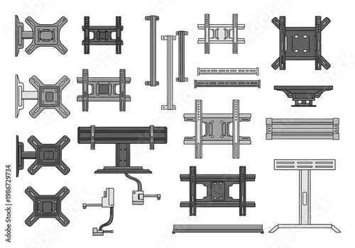 Various TV mounts and stands are arranged on a white surface for display purposes.