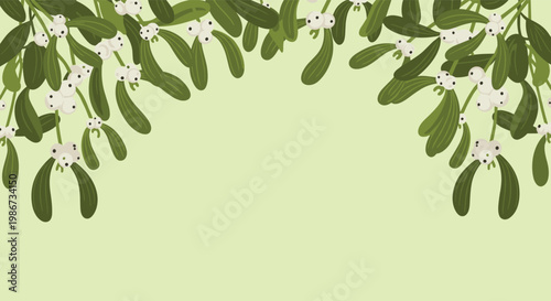 Decorative mistletoe border with green leaves and white berries arranged in an arc on a soft light green background for holidays.