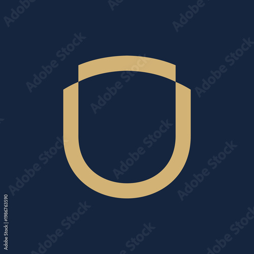 A minimalist gold letter U logo on a dark blue background, featuring a stylized and elegant design.
