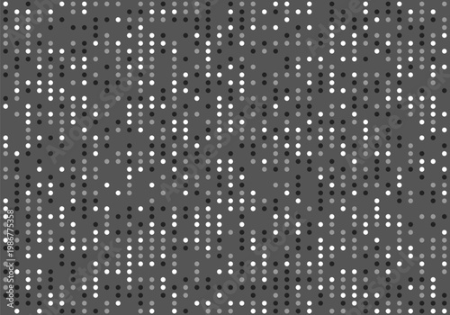 Seamless pattern of scattered gray white and black dots on a dark gray background
