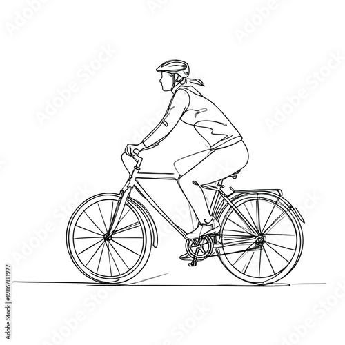 Cyclist rides bicycle on road in city outdoors in daytime