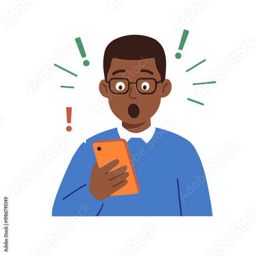 A surprised man reacts to his phone in shock indoors