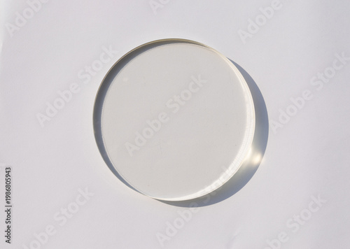 Obraz na plátně Top View of Round Transparent Glass Petri Dish or Coaster on White Background