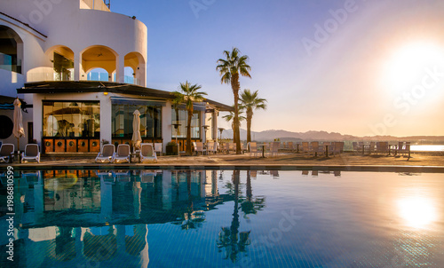 Wallpaper Mural Sunset over the pool overlooking the sea
 Torontodigital.ca