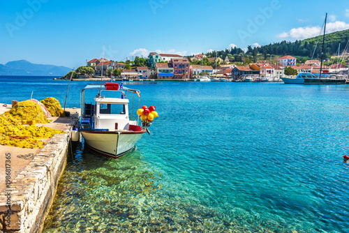 Beautiful scenic landscape with a boat on the embankment in Nydri, Lefkada, Greece. Stunning amazing charming places.