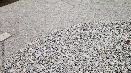 displays two distinct types of aggregate commonly used in Japanese Zen gardens karesansui a fine-grained material typically referred to as zen sand or fine gravel, and a larger, rounded river pebble o