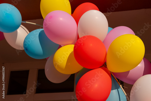 Colorful balloons fill the air with joy during a festive celebration outdoors
