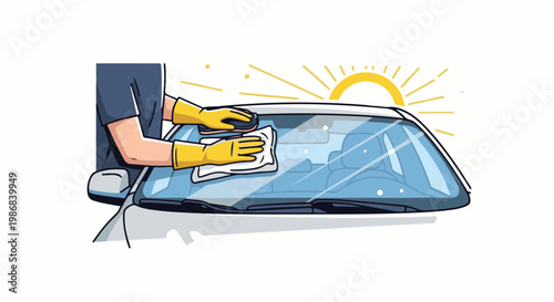 Hands in yellow gloves clean a car windshield in the sun