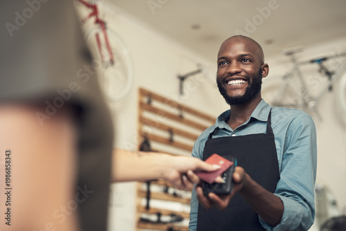 Canvas Print Man, customer and credit card in bicycle shop with POS machine, sale and payment for cycling gear