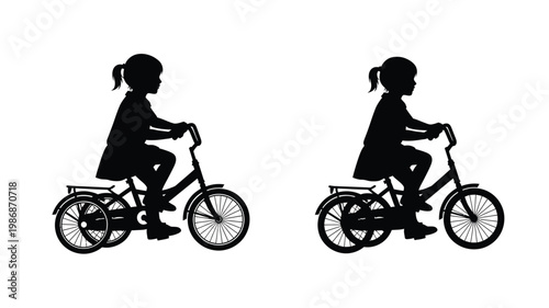 Two young girls riding tricycles a striking black silhouette