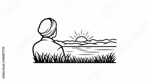 Man in turban watching sunrise over water and hills