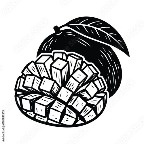 Mango fruit cut into cubes with leaf black and white.