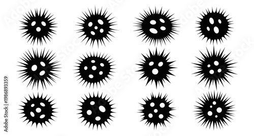 Set of diverse spiky microbe icons in silhouette on white background