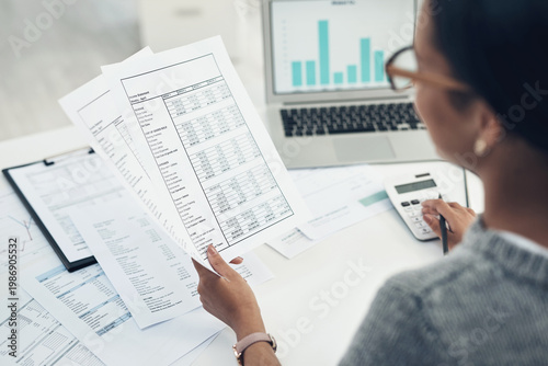 Reading, document or hands with calculator in office, balance sheet audit or balancing ledger process. Review, laptop screen or woman with chart for compliance check, tax filing or credit report