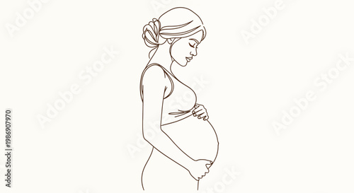 A pregnant woman gently touches her belly in a serene moment.