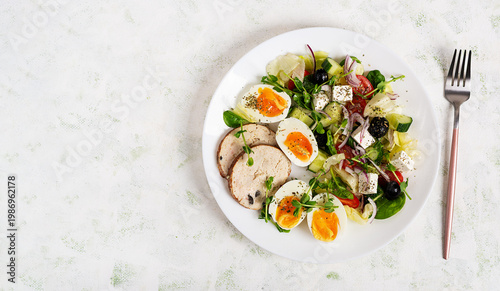 Healthy Salad with Boiled Eggs and Vegetables on White Background