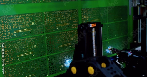 Modern production. Automated high-precision board manufacturing machine Produces printed digital electronic boards. Automatic assembly of smd components. Electronic chip production close-up.