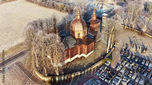 Drone perspective of church and cemetery in countryside