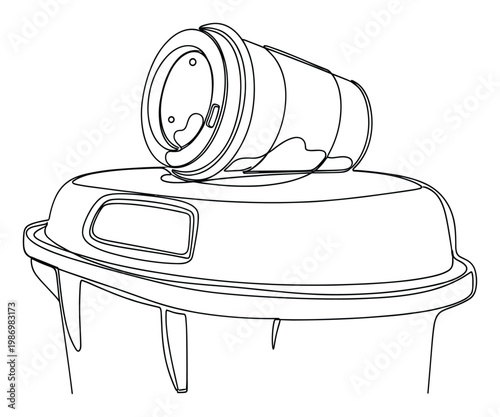 Spilled reusable coffee cup on a waste bin emphasizes sustainable living and proper waste management