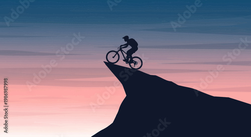 Mountain Biker Silhouetted Against Dramatic Sunset Sky