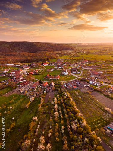 Aerial view of Charlottenburg circular village in Timis, Romania at sunset
