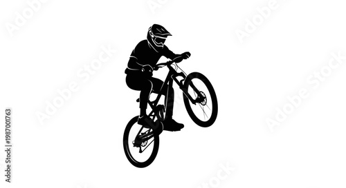 Silhouette Of A Mountain Biker Performing A Wheelie On A White Background