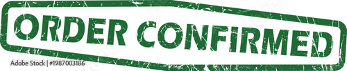 Green distressed rubber stamp impression with the text order confirmed in a rectangular border