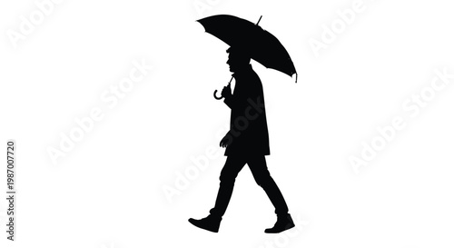 Silhouette of person walking with an umbrella on a rainy day outside alone
