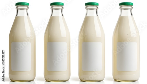 Packaging for dairy items, glass bottles containing milk set against a white backdrop. Unlabeled bottles filled with milk

