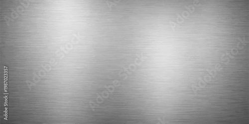 Industrial brushed silver metal plate with a polished stainless steel texture and shiny aluminum surface pattern featuring grey metallic reflections on a grey material background