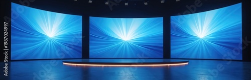 Three curved screens display abstract blue light waves in an empty modern studio. The circular stage has orange accent lights. This minimalist space suits presentations, events, or tech showcases.