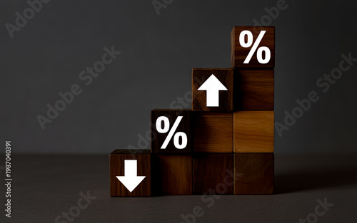 Wooden Blocks with Percentage and Arrow Symbols Showing Financial Fluctuations