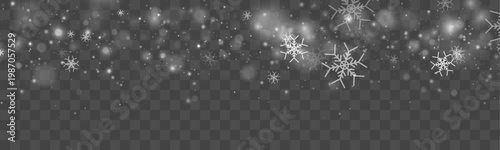 White snowflakes drifting softly on transparent background. Subtle blur adds depth and elegance. Perfect seasonal design element.