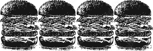 Four grilled cheeseburgers with lettuce and tomato in toasted buns, arranged in a row