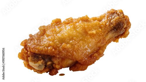 Crispy golden fried chicken wing coated in batter, isolated on transparent background