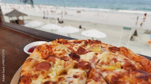 Hawaiian style sausage pizza. Delicious meal with pineapple and tomato. Hot snack on wooden board looks great for lunch by seaside at resort. Every hawaiian style sausage pizza task.